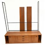 A 1960’s teak wall unit system, comprising two shelves and unit with two sliding cupboard doors