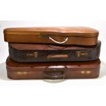 A mahogany veneered double violin case with fitted interior, a leather W E Hill & Sons double violin