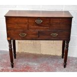 A mahogany desk, converted from a 19th century spinet, inlaid with ebony stringing, the fall front