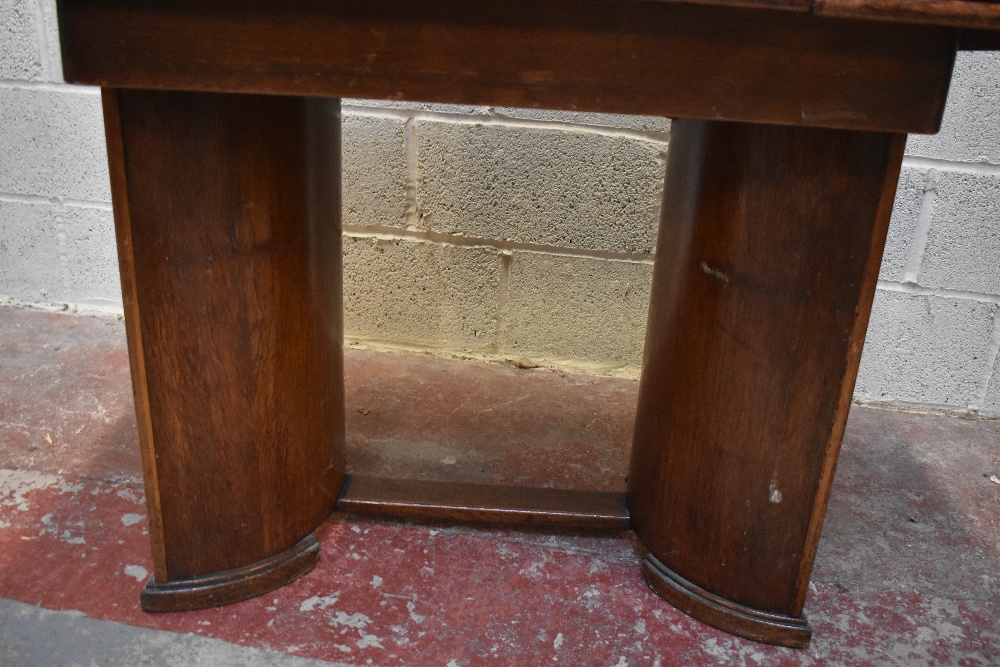 A late Art Deco oak extending dining table and four chairs, the rectangular table with two pull - Image 2 of 5