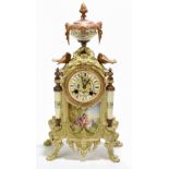 A late 19th century French painted and patinated spelter porcelain mounted eight day mantel clock,