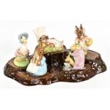 BESWICK; three Beatrix Potter figures comprising 'Mrs Rabbit', 'Jemima Puddle-Duck' and 'Mrs