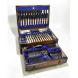 An early 20th century oak cased canteen of silver plated cutlery by Viners Ltd, width of canteen