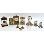 An assortment of seven mantel timepieces including a Smiths battery operated lantern timepiece, a