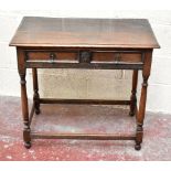 An 18th century oak single drawer side table on turned stretchered supports, width 84cm.