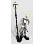 MURANO; a large and impressive figural table lamp representing a clown wearing a checkered