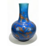 A large and impressive Chinese ceramic baluster form vase with relief chinoiserie decoration