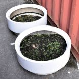 Two 1960s white fibreglass stacking planters of circular form, diameter 70cm (2).