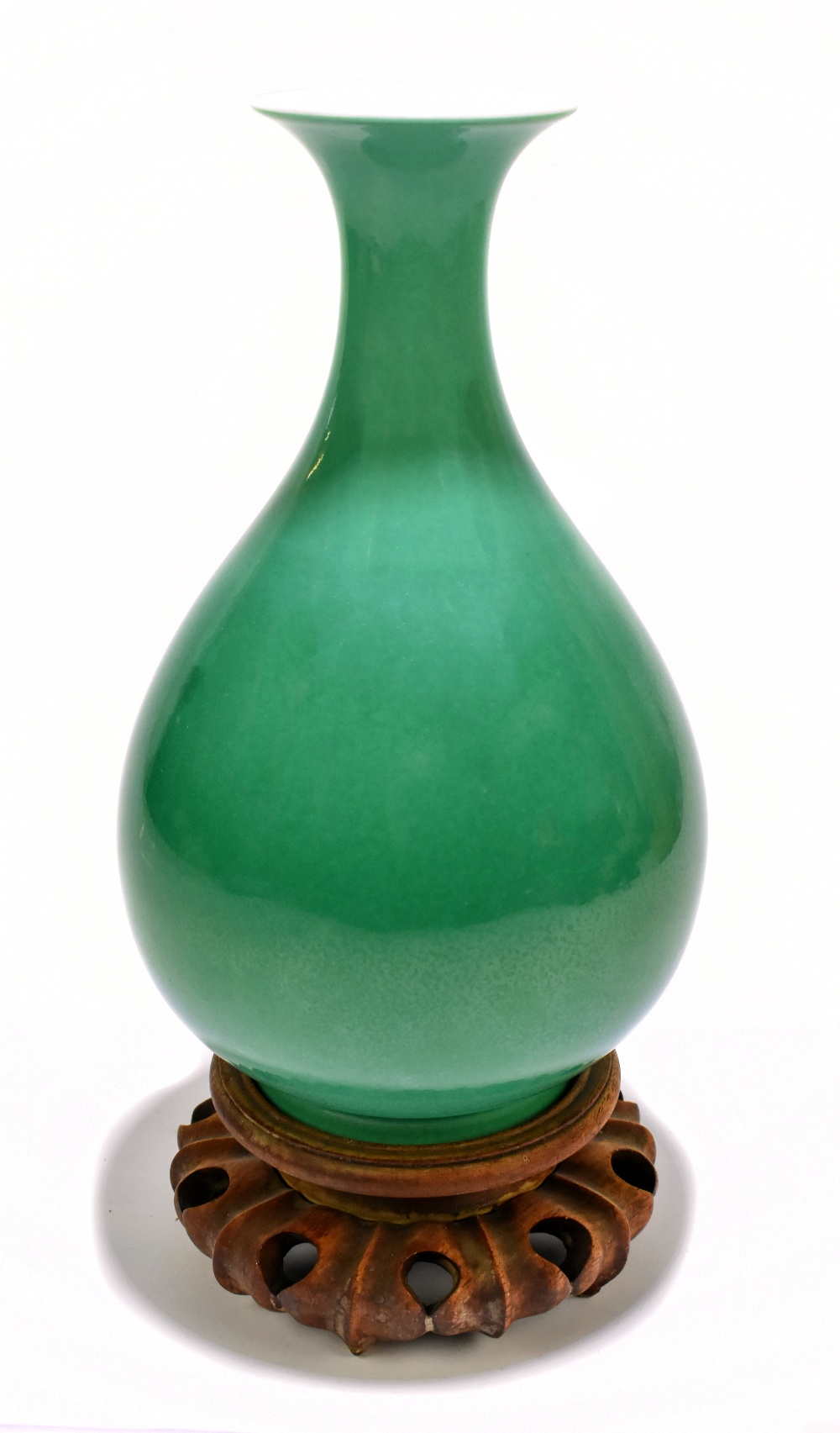 A Chinese porcelain apple green glazed Yuhuchunping shaped vase, bears Qianlong seal mark and