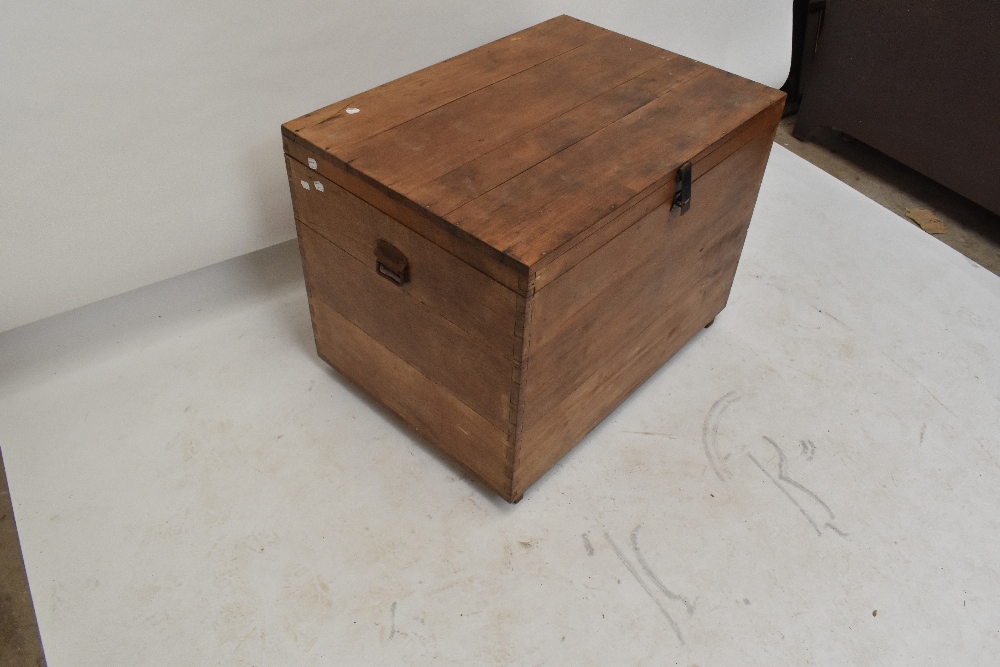 An early 20th century teak trunk of rectangular form, with cast metal side handles, width 90cm, - Bild 3 aus 8