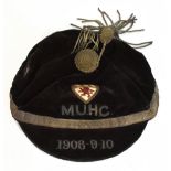 M.U.H.C.; a silk cap with shield depicting a rampant lion above 1908-9-10.