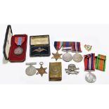 A Canadian WWII medal trio to include a Volunteer Service Medal, with three other medals, an