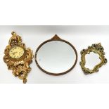 A Continental Louis XV style gilt wood and gesso cartel type wall clock, the dial with Roman