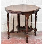 An Edwardian walnut octagonal topped occasional table, with undertier galleried tray, height 74cm,