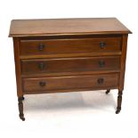 An Edwardian mahogany mirror back dressing chest of three drawers, raised on turned column legs,