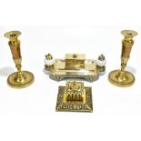 A 19th century brass desk stand, with cast Greek key decoration to the central stamp box, flanked by