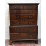 A George III mahogany chest on chest, with moulded cornice above two short and three long drawers,