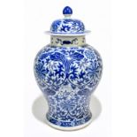 A late 19th century Chinese blue and white porcelain temple jar and cover, the top rim painted