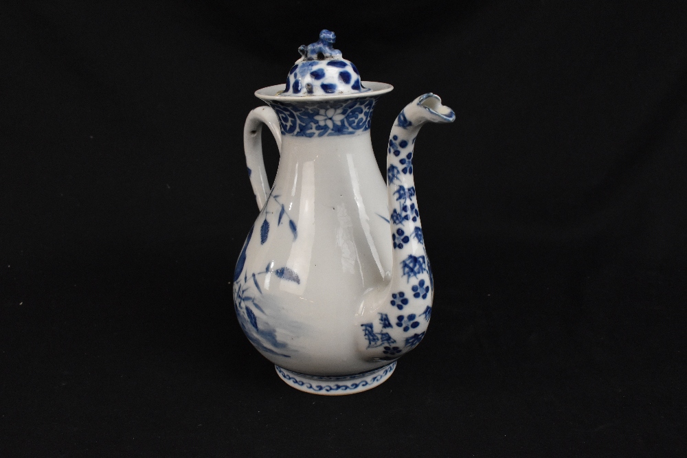 An 18th century Chinese blue and white ewer decorated with two different birds and floral motifs, - Bild 2 aus 10