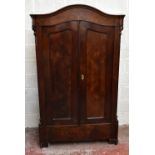 A late 19th century walnut two door hanging wardrobe, with serpentine top, on bracket feet, height