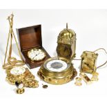 An assortment of modern timepieces comprising a Swiss gilt metal cartel type wall timepiece, a brass