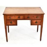 A Georgian mahogany writing table, with crossbanded detail to the four drawer fronts, with four