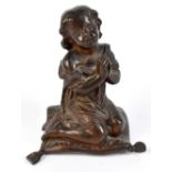 AFTER M MOREAU; a reproduction cast bronze figure of a girl kneeling on a cushion, with cast