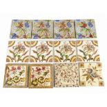 A collection of twelve Victorian dust pressed tiles including two decorated with geraniums within