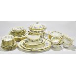 WEDGWOOD; a fifty eight piece part dinner and tea service decorated with leaves on a yellow