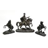 AFTER GUILLAUME COUSTOU; a pair of 20th bronzed spelter Marly Horses, raised on oval plinth bases,