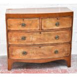 A 19th century mahogany bowfronted chest of two short and three long drawers on bracket feet,