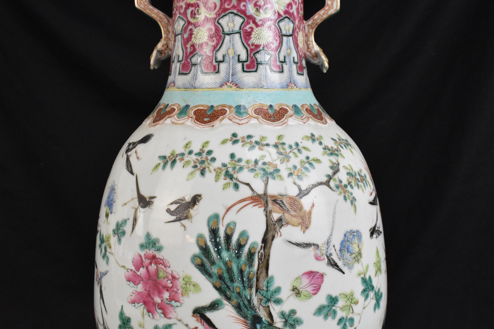 A large 19th century Chinese porcelain twin handled Famille Rose vase with flared neck with - Bild 4 aus 24