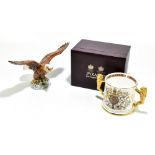 BESWICK; a figure of a bald eagle, 1018, and a Paragon limited edition loving cup produced to