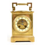 A 19th century French brass cased combination bracket clock and barometer, the chapter ring set with