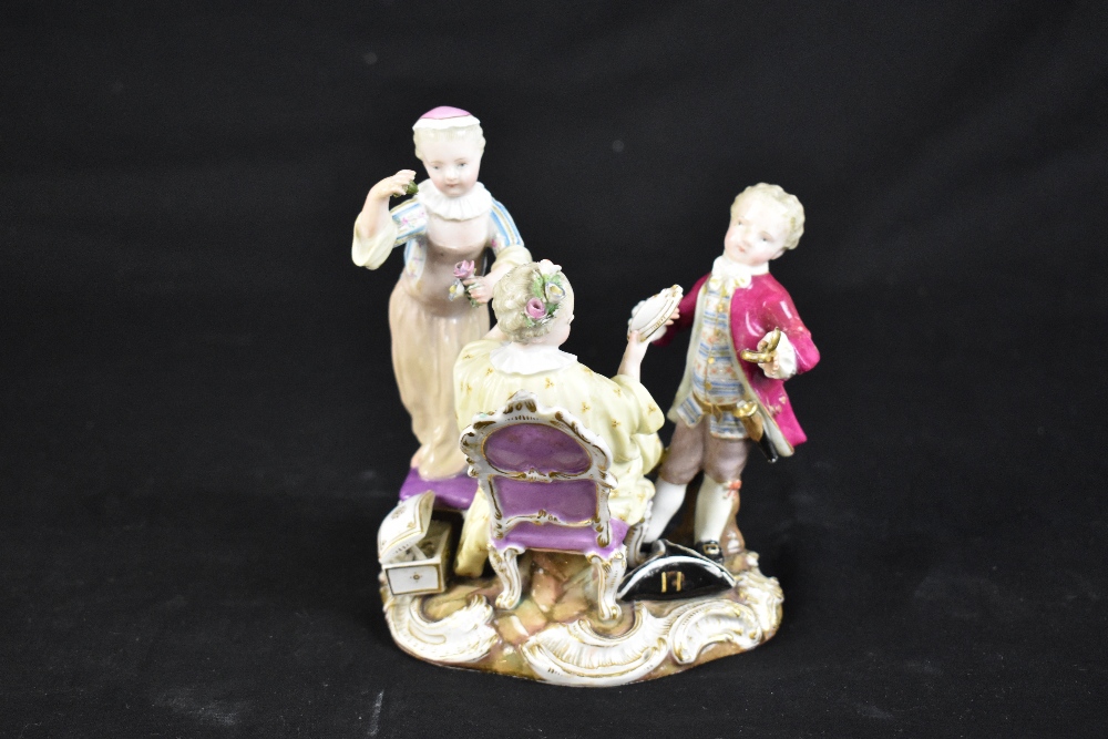 MEISSEN; a porcelain group of a maiden seated upon a chair with two attendants beside, on rococo - Bild 3 aus 9