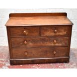 A Victorian mahogany chest of two short and two long drawers, raised on bun feet, width 115cm, depth