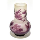 EMILE GALLÉ (1846-1904); a cameo glass vase of bulbous form with cylindrical neck and with purple