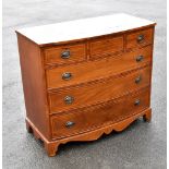 A Victorian mahogany bowfront chest of three short over three long drawers, with satinwood