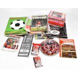 MANCHESTER UNITED; a group of collectors' items and ephemera, to include booklets, brochures, DVD’s,