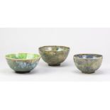 ANDREW CHAMBERS; a group of three stoneware bowls, green and blue glazes, one with decals of
