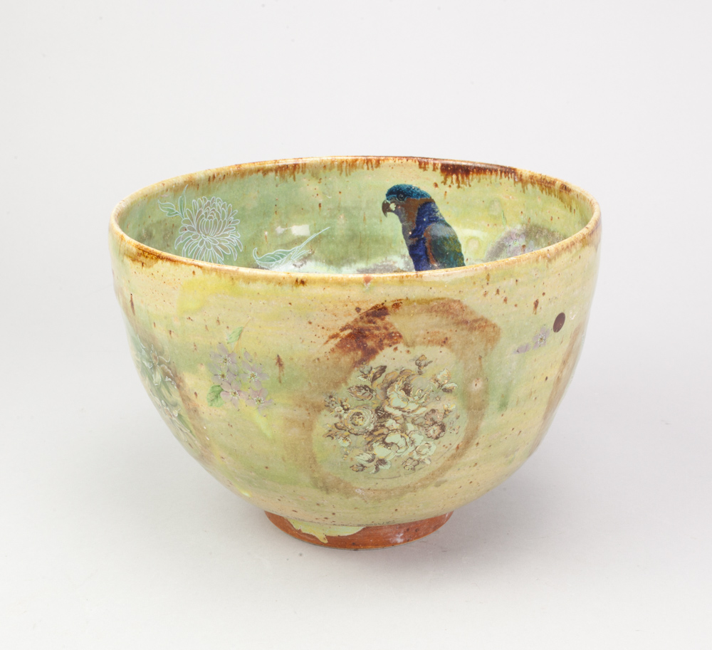 ANDREW CHAMBERS; a deep stoneware bowl covered in green glaze with decals of a parrot, leopard and - Image 2 of 6