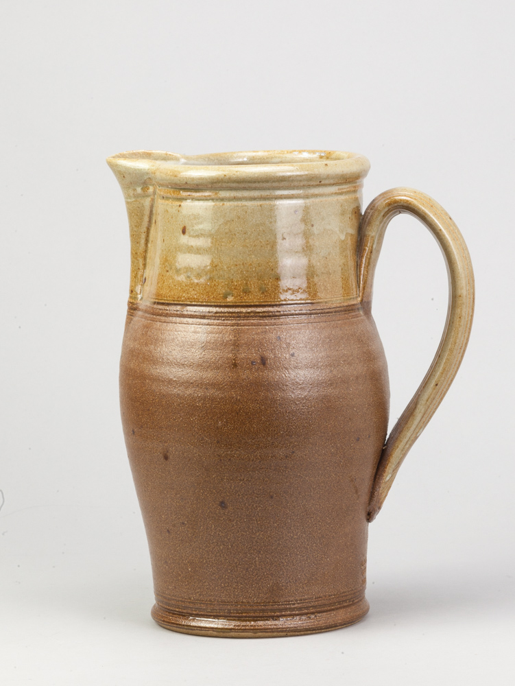 ANDREW YOUNG (born 1949) & JOANNA YOUNG (born 1950); a large stoneware jug with glossy green glaze