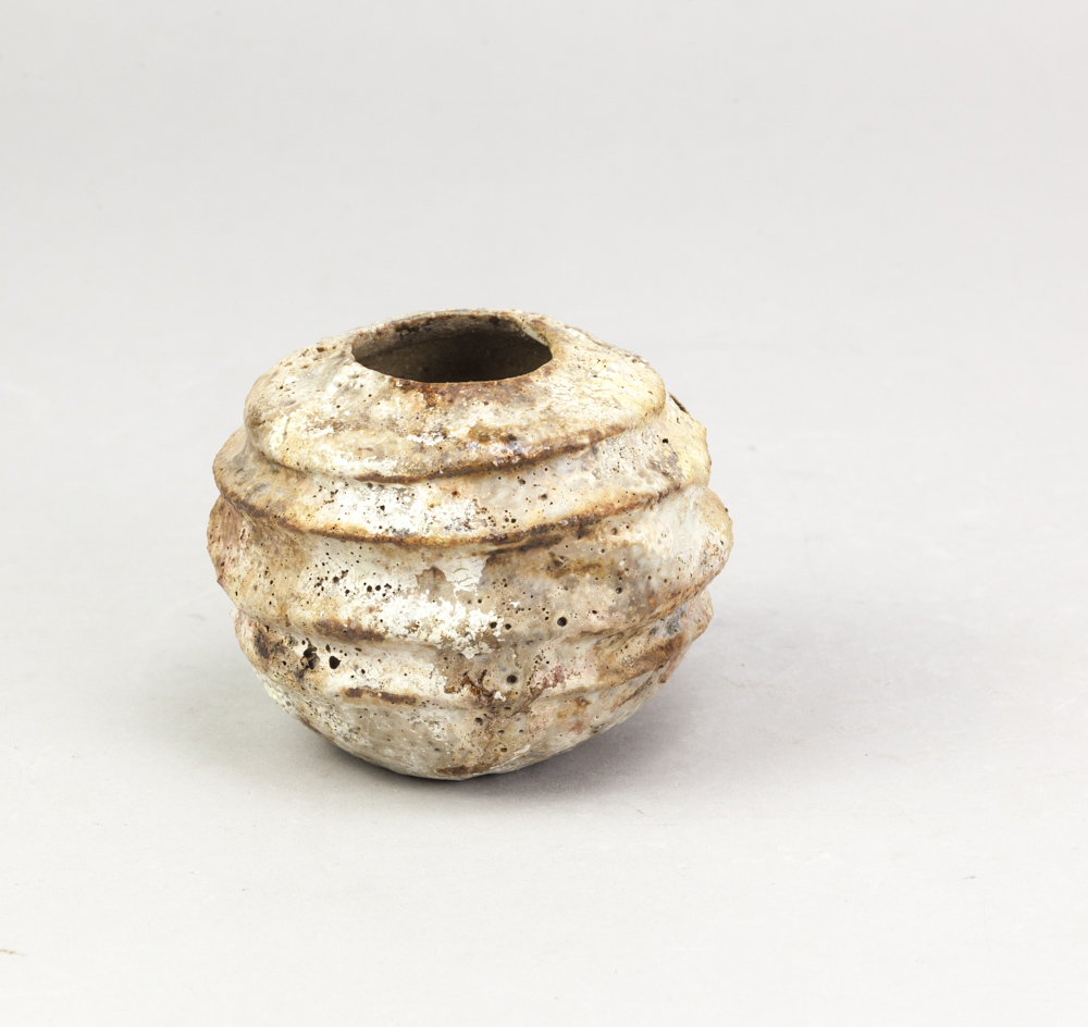 AKI MORIUCHI (born 1947); a ribbed stoneware vessel with heavily textured surface, impressed mark,