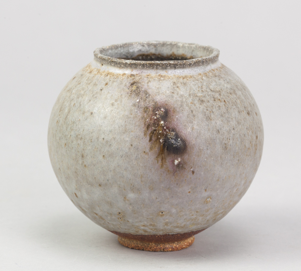 ADAM BUICK (born 1978); a miniature stoneware moon jar covered in grey glaze with iron decoration,