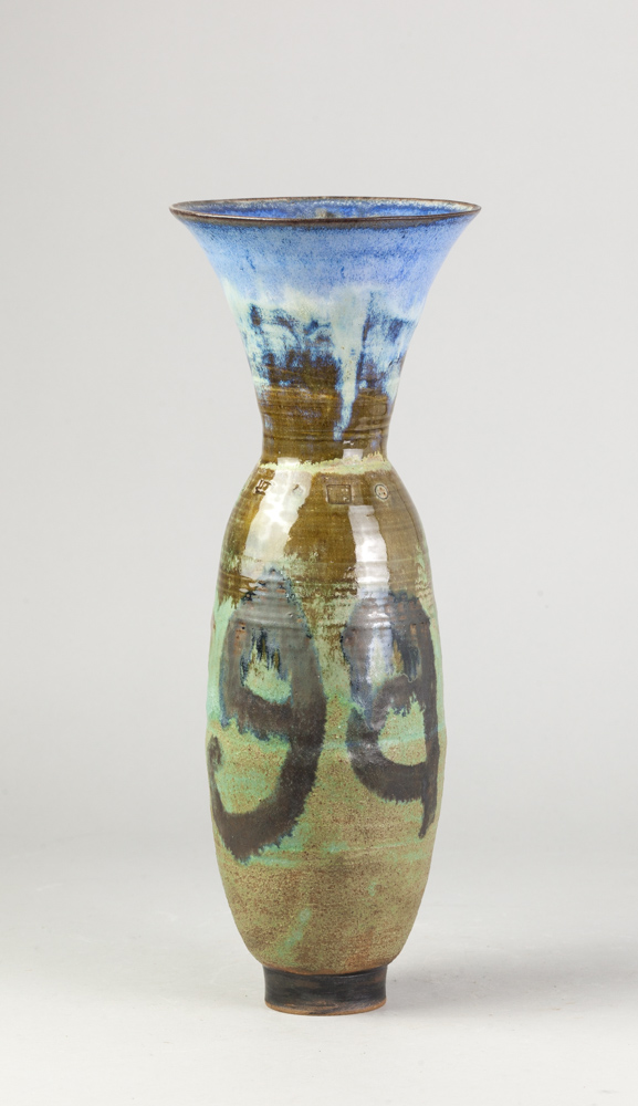 ANDREW CHAMBERS; a tall stoneware vase covered in sea green glaze with blue top, the word Gaia