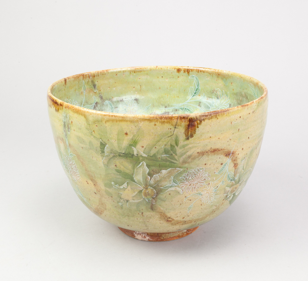 ANDREW CHAMBERS; a deep stoneware bowl covered in green glaze with decals of a parrot, leopard and - Image 3 of 6