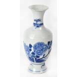 A 19th century Chinese blue and white baluster vase with flared rim,