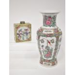 An early 20th century Chinese porcelain vase of baluster form and flared rim,
