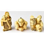 Three Japanese netsuke comprising a contortionist, a seated man holding a sack and bowl,