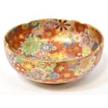 A Japanese Meiji Period Satsuma floral gilt-heightened bowl, with vibrant chrysanthemum,